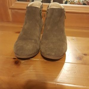 Low heeled, closed toed, side zippered boots